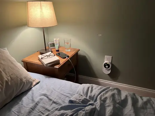 Ion Pure Pro plugged in beside the bed at night